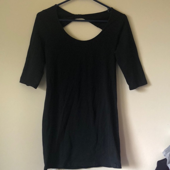 Black bodycon garage dress. - Picture 1 of 3